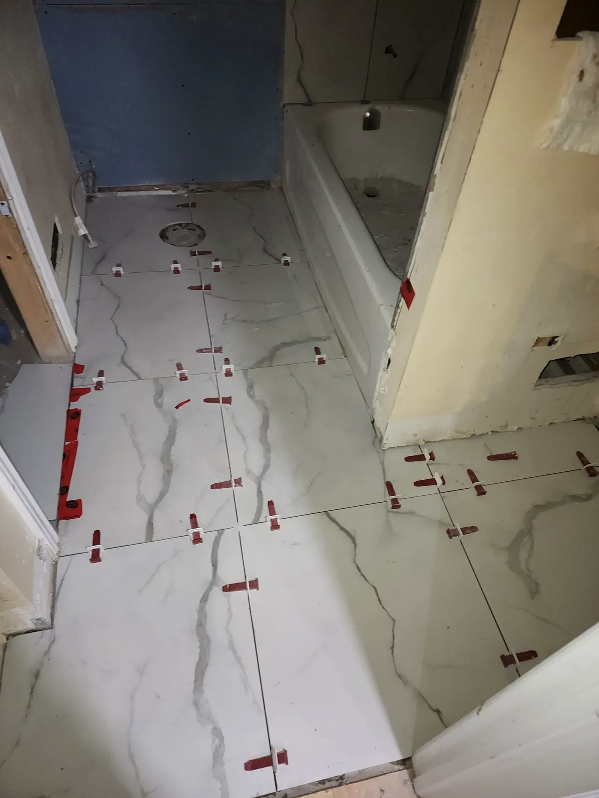 Empire Design & Construction job photo: Tile leveling install