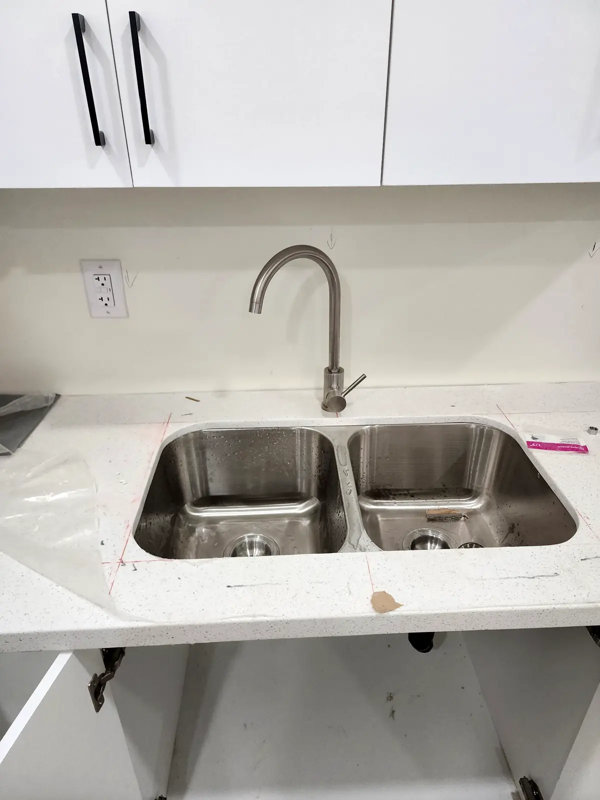 Cabinet Accessories Empire Design & Construction job photo: Undermount sink quartz